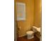 Cozy powder room with a pedestal sink and natural light from a window at 4036 Carlinswood Way, Stone Mountain, GA 30083