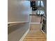 Carpeted staircase with wood railing overlooking the living area at 4036 Carlinswood Way, Stone Mountain, GA 30083