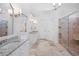 Bright bathroom featuring double vanities, granite countertops, and a spacious glass-enclosed shower at 4185 Waterford Dr, Suwanee, GA 30024