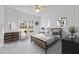 Bright bedroom featuring a neutral color palette and natural light from the windows at 4185 Waterford Dr, Suwanee, GA 30024