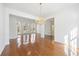 Bright living room with large windows, hardwood floors and an open floor plan at 4185 Waterford Dr, Suwanee, GA 30024