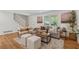 Cozy living room with staircase, fireplace, and comfortable seating at 388 Pine Trl, Canton, GA 30115