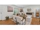 Comfortable living room with a fireplace and view to the kitchen at 388 Pine Trl, Canton, GA 30115