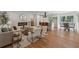 Inviting living room flowing into the kitchen, featuring stylish decor and natural light at 388 Pine Trl, Canton, GA 30115