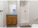 Functional bathroom with a vanity, mirror, and a walk-in shower with white walls at 6340 Hickory Lane Cir, Union City, GA 30291