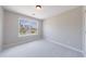 Bedroom featuring a window and neutral carpet and paint at 6340 Hickory Lane Cir, Union City, GA 30291