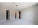 Well-lit carpeted bedroom with two closets and doorway views at 6340 Hickory Lane Cir, Union City, GA 30291