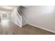 Entryway with hardwood floors, a staircase, and a view into the living area at 6340 Hickory Lane Cir, Union City, GA 30291