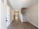 Inviting foyer with hardwood floors, a staircase, and a view into the living area at 6340 Hickory Lane Cir, Union City, GA 30291