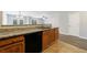 Modern kitchen with granite counters seamlessly flowing into the dining area at 6340 Hickory Lane Cir, Union City, GA 30291