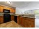 Open kitchen featuring granite countertops and a convenient breakfast bar at 6340 Hickory Lane Cir, Union City, GA 30291