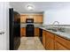 Well-equipped kitchen with granite countertops and efficient black appliances at 6340 Hickory Lane Cir, Union City, GA 30291