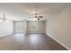 Bright living room with French doors and a ceiling fan for added comfort at 6340 Hickory Lane Cir, Union City, GA 30291