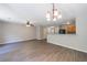 Cozy living room with hardwood floors that connects to the kitchen counter at 6340 Hickory Lane Cir, Union City, GA 30291