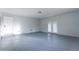 Finished basement space with a walkout and a utility door at 3036 Crabapple Cir, Decatur, GA 30034