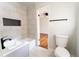 Nicely remodeled bathroom featuring a modern vanity, sleek fixtures, and tiled shower at 3036 Crabapple Cir, Decatur, GA 30034