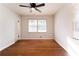 Bright bedroom with hardwood floors, ceiling fan, and large windows with lots of natural light at 3036 Crabapple Cir, Decatur, GA 30034