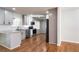 Updated kitchen with gray cabinets, stainless steel appliances, and hardwood floors at 3036 Crabapple Cir, Decatur, GA 30034