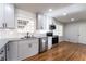 Bright kitchen featuring gray cabinetry, stainless steel appliances, and ample counter space at 3036 Crabapple Cir, Decatur, GA 30034