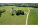 Expansive green acreage featuring a stunning home and winding driveway at 5187 Parkview Rd, Social Circle, GA 30025