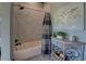 Bathroom featuring tiled walls, patterned shower curtain, and decorative vanity at 5187 Parkview Rd, Social Circle, GA 30025