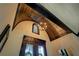 Elegant foyer features wood-trimmed ceiling, double front doors, and chandelier at 5187 Parkview Rd, Social Circle, GA 30025