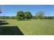 Lush green field with mature trees, perfect for recreation or development at 5187 Parkview Rd, Social Circle, GA 30025