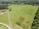 Aerial view of the vast land surrounding the home, offering privacy and space at 5187 Parkview Rd, Social Circle, GA 30025