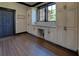 Mudroom area featuring custom cabinetry and counter space at 5187 Parkview Rd, Social Circle, GA 30025