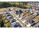 Aerial view of a new construction neighborhood and community pool at 530 Payne Rd, Woodstock, GA 30188
