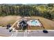 Aerial view of a community pool with seating and landscaping at 530 Payne Rd, Woodstock, GA 30188