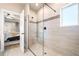 Modern shower showcasing seamless glass enclosure and neutral tile work at 530 Payne Rd, Woodstock, GA 30188