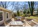 Spacious backyard with stone paved patio, outdoor seating and dining area, perfect for entertaining guests at 1045 Moreland Se Ave, Atlanta, GA 30316