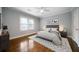 Bedroom features hardwood floors, natural light and modern decor at 1045 Moreland Se Ave, Atlanta, GA 30316