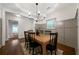 Dining room features include wainscoting detail and chandelier lighting at 1045 Moreland Se Ave, Atlanta, GA 30316