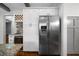 Kitchen featuring stainless steel refrigerator, wine rack and granite countertops at 1045 Moreland Se Ave, Atlanta, GA 30316