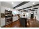 Modern kitchen with an island, stainless steel appliances and dark wood flooring at 1045 Moreland Se Ave, Atlanta, GA 30316
