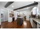Bright kitchen with a center island, stainless steel appliances, and access to the bathroom at 1045 Moreland Se Ave, Atlanta, GA 30316