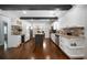 Modern kitchen with white cabinets, stainless steel appliances, and a center island with seating at 1045 Moreland Se Ave, Atlanta, GA 30316
