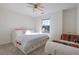 Cozy bedroom with a daybed, window, carpeted floor, and an accent chair at 3184 Elmwood Ct, Atlanta, GA 30349