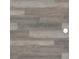 Close-up of modern wood-look vinyl flooring, featuring gray and light-grey tones with a natural texture at 3333 Tarian Way, Decatur, GA 30034