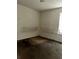 This is a bedroom with stained walls and carpet at 3628 Hopkins Ct, Powder Springs, GA 30127