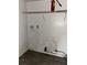 Room featuring a wire shelf, mold, and dark wood-look vinyl flooring at 3628 Hopkins Ct, Powder Springs, GA 30127