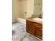 Functional bathroom featuring vanity with a sink and a bathtub with a shower at 3634 Hopkins Ct, Powder Springs, GA 30127