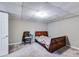 Finished basement bedroom with carpet, a bed, and neutral walls, suitable for a guest room at 674 Fairview Dr, Dallas, GA 30157