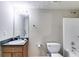 Standard bathroom featuring a single sink vanity and shower with a tub at 674 Fairview Dr, Dallas, GA 30157