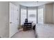 Bedroom featuring a bay window, carpeted floor, small table, and neutral walls at 674 Fairview Dr, Dallas, GA 30157
