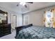 Spacious bedroom with a large bed, dresser, and ample natural light from a large window at 674 Fairview Dr, Dallas, GA 30157