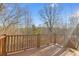 Wood deck overlooking a wooded area, perfect for enjoying nature at 674 Fairview Dr, Dallas, GA 30157