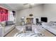 Bright living room boasts a fireplace, neutral tones, and large windows, creating an inviting atmosphere at 674 Fairview Dr, Dallas, GA 30157